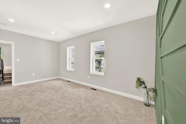 view of carpeted spare room