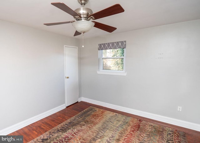 unfurnished room featuring ceiling fan and hardwood / wood-style floors