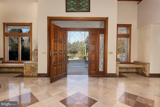 entryway featuring a high ceiling