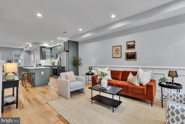 living room with light hardwood / wood-style floors