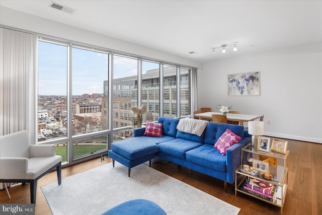 675 President St Unit 1406, Baltimore, MD 21202 - living area featuring wood finished floors and a view of city