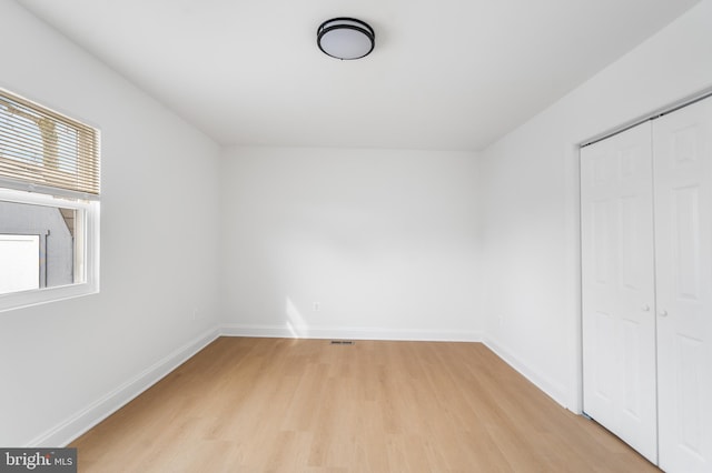 bonus room featuring light wood-type flooring