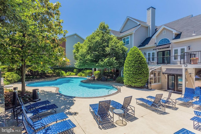 view of pool with a patio area