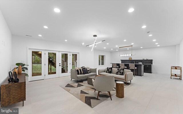 6330 Cross St, Mclean, VA 22101 - living room with recessed lighting, french doors, and bar area