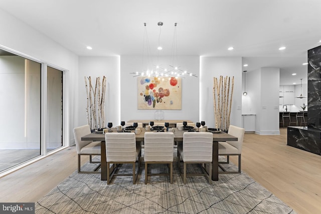 dining area with light hardwood / wood-style flooring