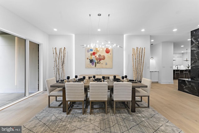 6330 Cross St, Mclean, VA 22101 - dining room featuring light wood finished floors, recessed lighting, and a chandelier