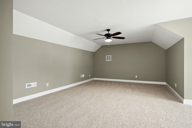 bonus room with carpet flooring, ceiling fan, and lofted ceiling