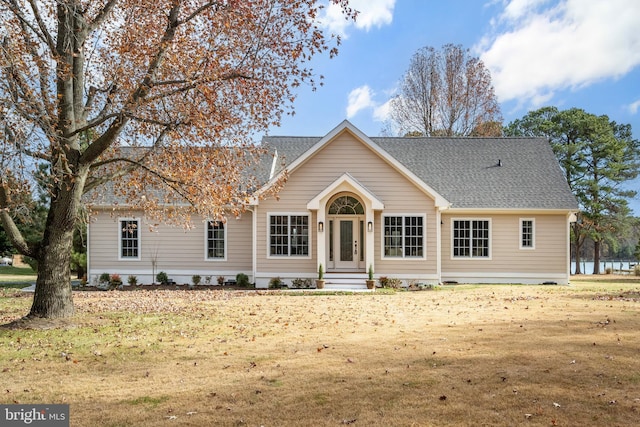 single story home with a front yard