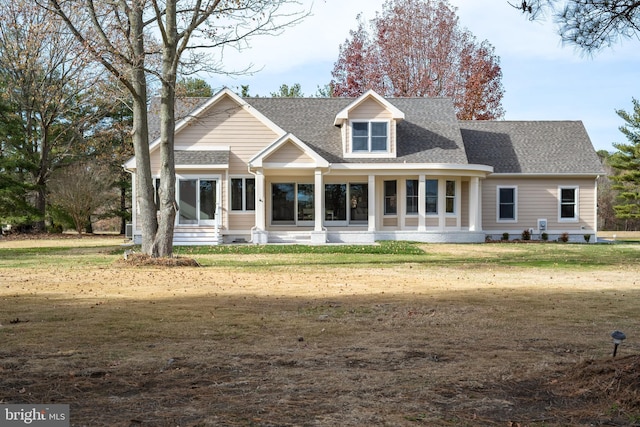 view of front of property with a front lawn