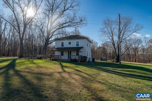 view of front of home featuring a porch and a front lawn