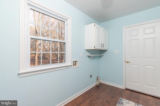 clothes washing area featuring cabinets, washer hookup, dark hardwood / wood-style flooring, and electric dryer hookup