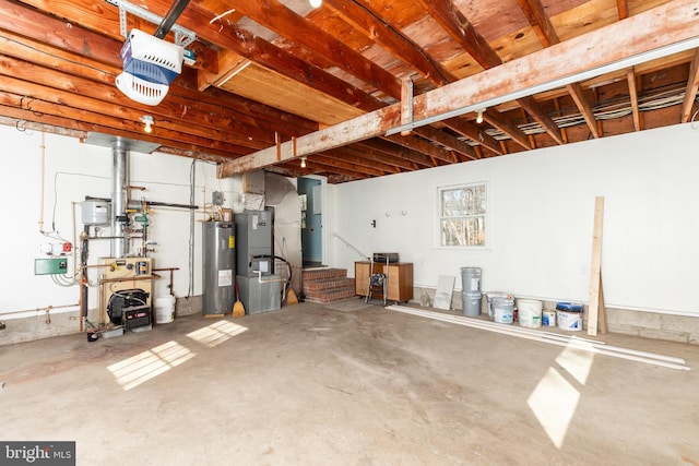 garage with heating unit, water heater, and a garage door opener