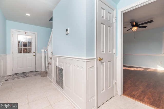 corridor featuring light hardwood / wood-style floors