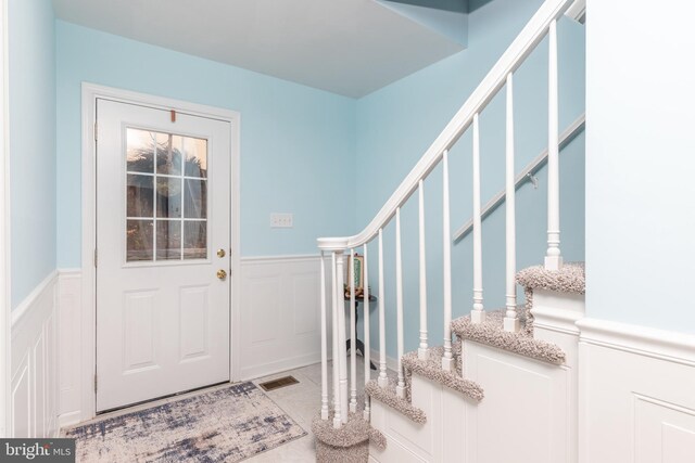 entryway featuring tile patterned floors