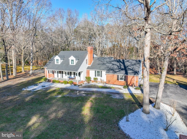 view of front of property with a porch and a front yard