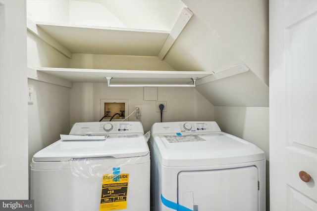 washroom featuring washer and dryer