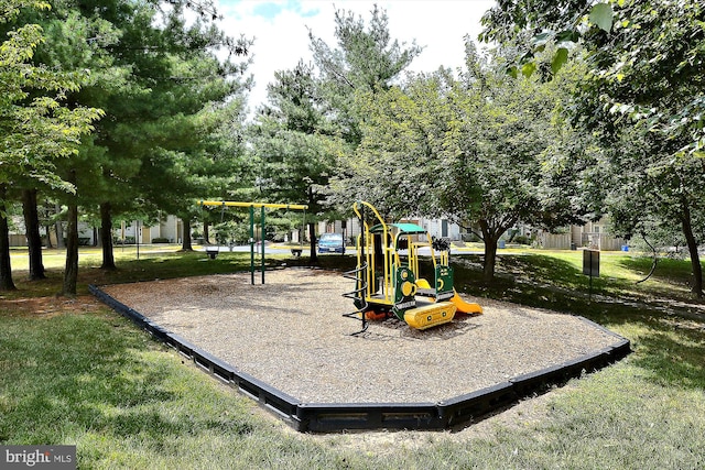 view of jungle gym featuring a yard