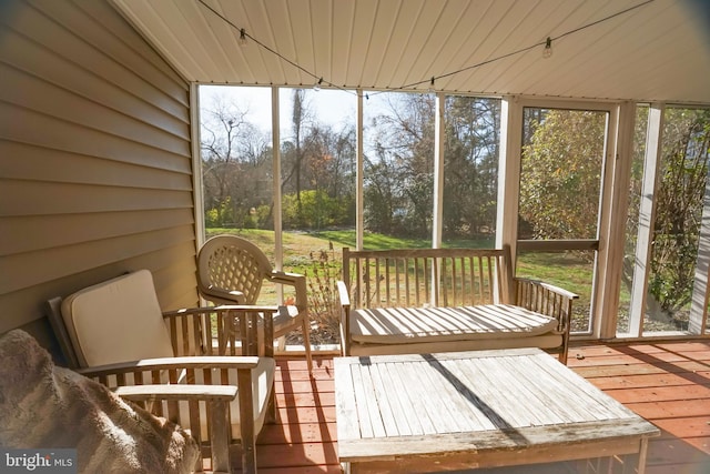 sunroom featuring wooden ceiling