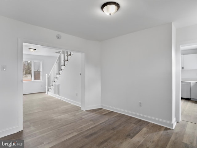 spare room featuring light hardwood / wood-style floors