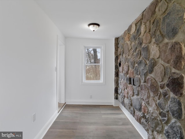 corridor featuring hardwood / wood-style flooring