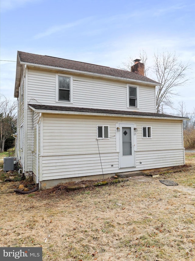 view of front of property featuring cooling unit