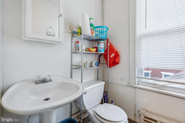 bathroom with toilet and sink