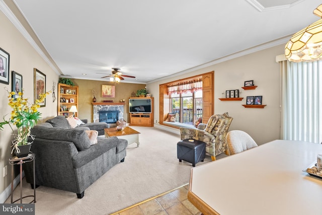 tiled living room featuring ceiling fan and ornamental molding