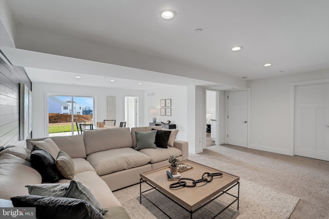 living room featuring light carpet