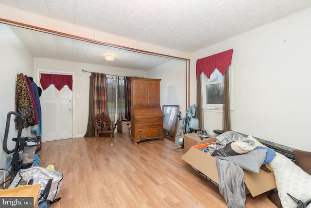 bedroom featuring light wood-style flooring