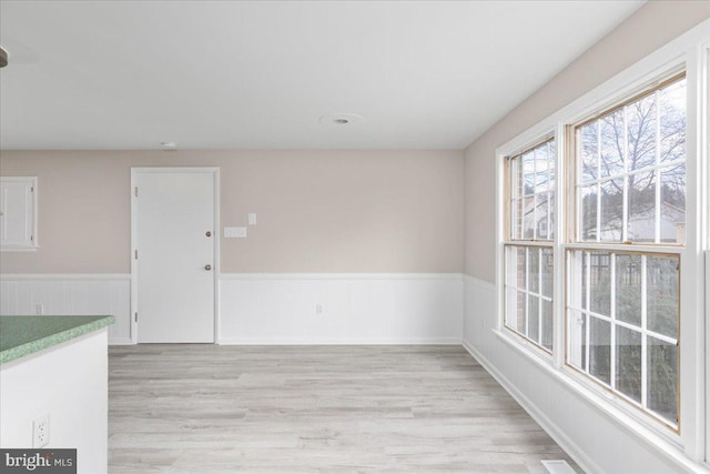 unfurnished room featuring light hardwood / wood-style flooring