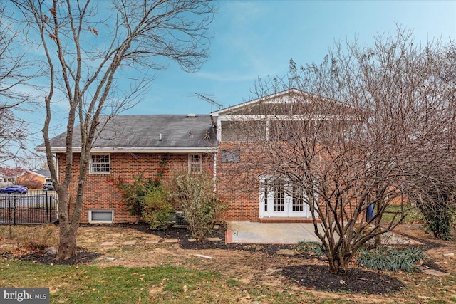 back of house featuring french doors and a patio