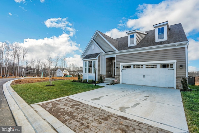 view of front of house with central air condition unit, a front yard, and a garage