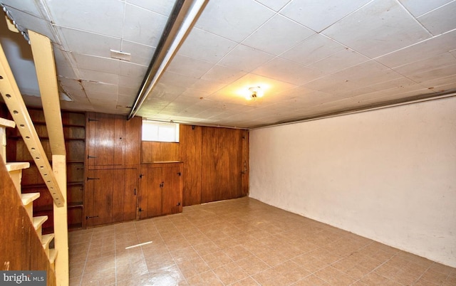 basement with wood walls