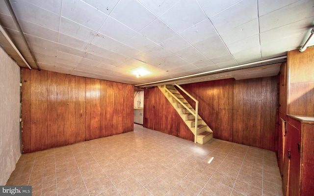 basement with wood walls