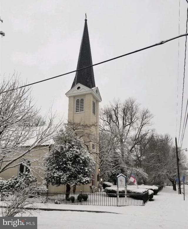 view of snow covered property