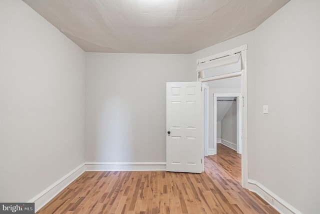 unfurnished room featuring light hardwood / wood-style flooring