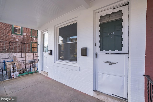 entrance to property with covered porch