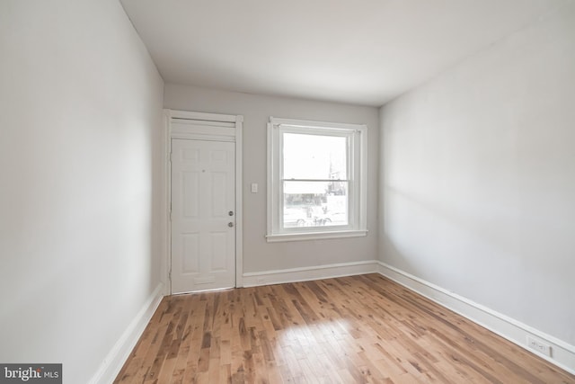 entrance foyer with light hardwood / wood-style flooring