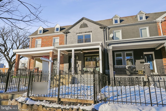 view of front of property featuring covered porch