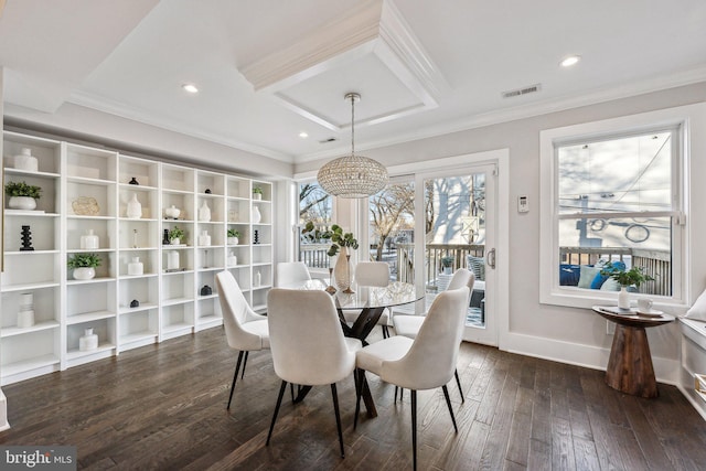 dining area with ornamental molding, dark hardwood / wood-style flooring, and a notable chandelier