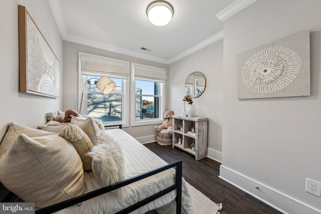 bedroom with crown molding and dark hardwood / wood-style floors