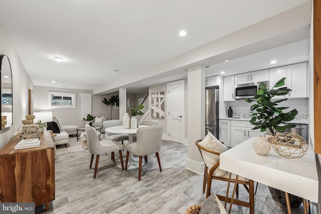 dining area featuring light hardwood / wood-style flooring