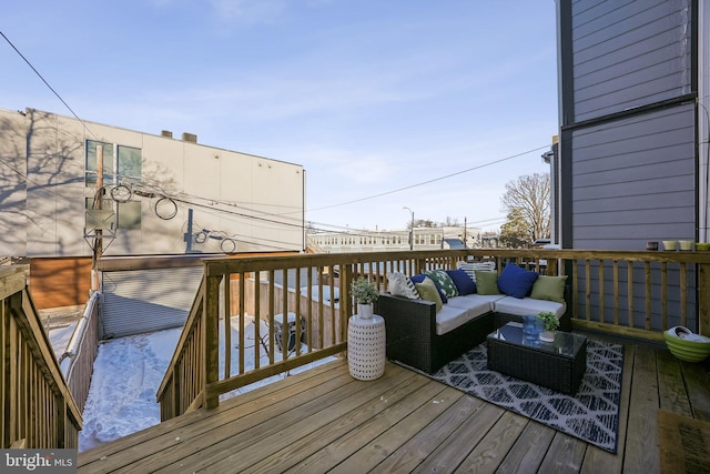 wooden deck featuring an outdoor hangout area