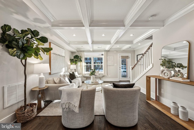 living room with beam ceiling, dark hardwood / wood-style floors, coffered ceiling, and ornamental molding