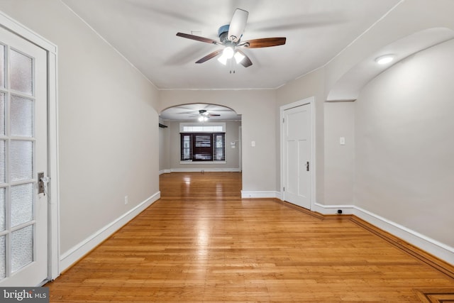 unfurnished room with light hardwood / wood-style floors and ceiling fan