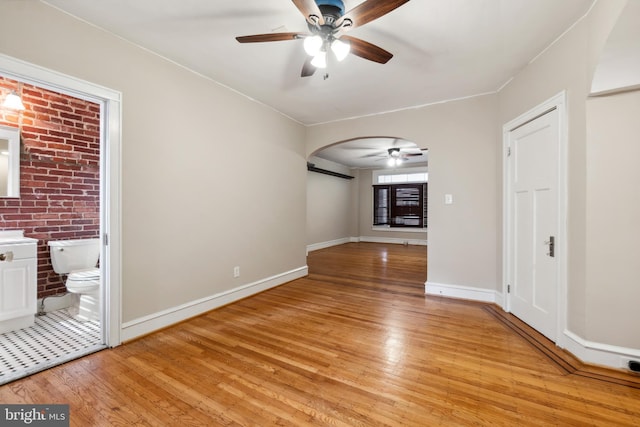 interior space with light hardwood / wood-style floors and ceiling fan