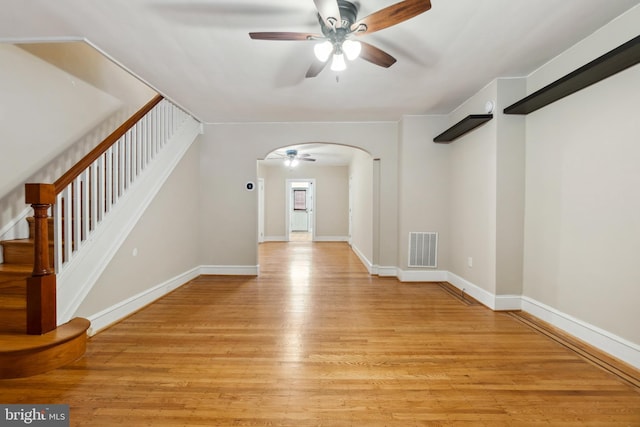 unfurnished room with light hardwood / wood-style floors and ceiling fan