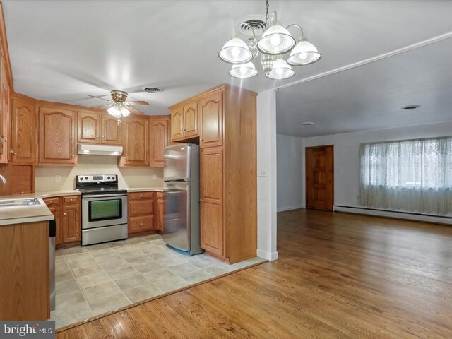 64 W Walter Ave, Greencastle, PA 17225 - corridor featuring a chandelier, wood finished floors, and baseboards