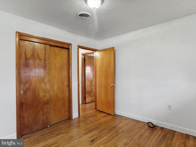 64 W Walter Ave, Greencastle, PA 17225 - single story home with driveway, brick siding, a garage, metal roof, and a chimney