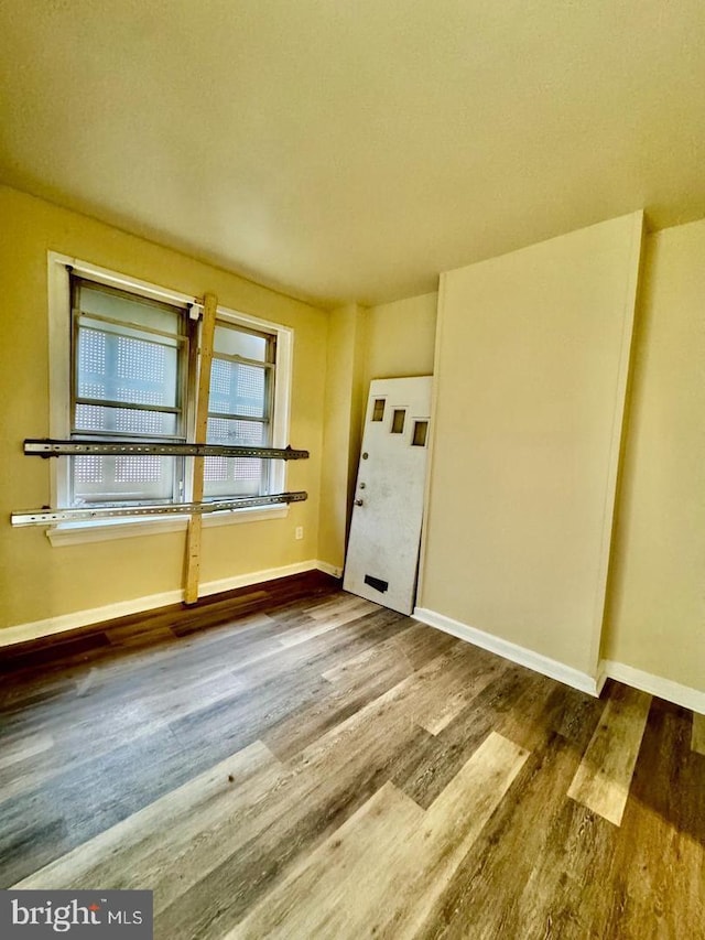 interior space with hardwood / wood-style floors